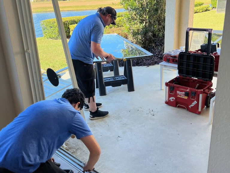 Stuck Door technician repairing a sliding glass door
