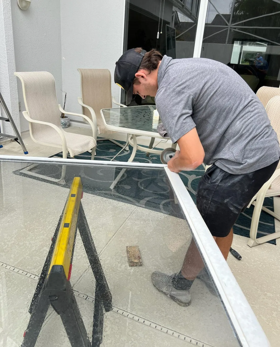 contractor installing sliding door