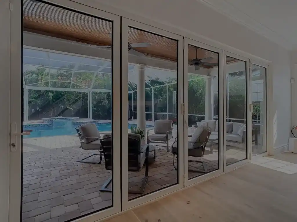 Sliding glass door with beach view