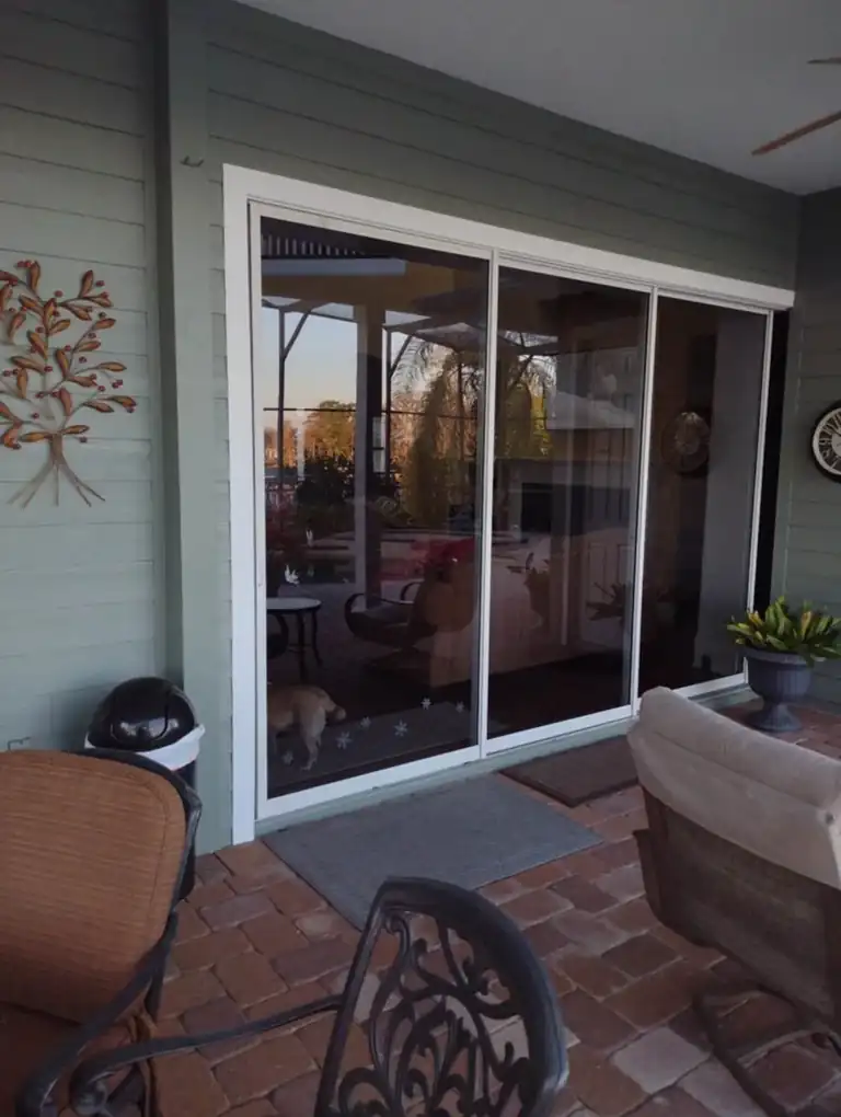 Sliding glass door on a Florida lanai, the type of patio door needing handle replacement